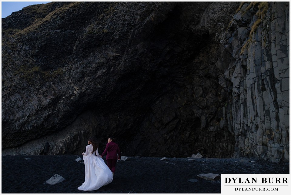 lgtbq iceland elopement wedding entering Hálsanefshellir Cave