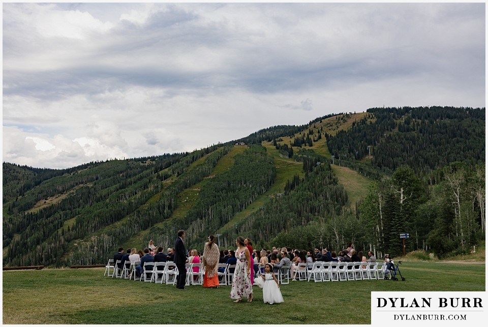 lgbtq wedding thunderhead lodge steamboat wedding ceremony on lawn