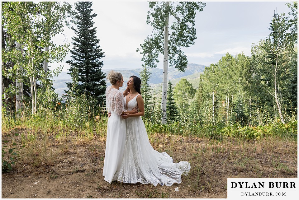 lgbtq wedding thunderhead lodge steamboat wedding brides together in aspen trees