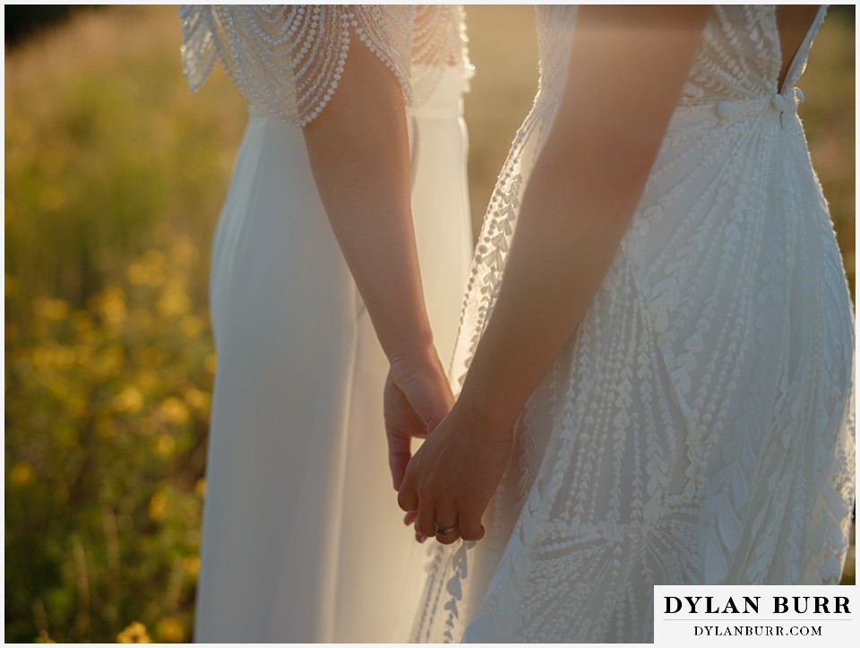 two brides at sunset thunderhead lodge wedding in steamboat springs colorado