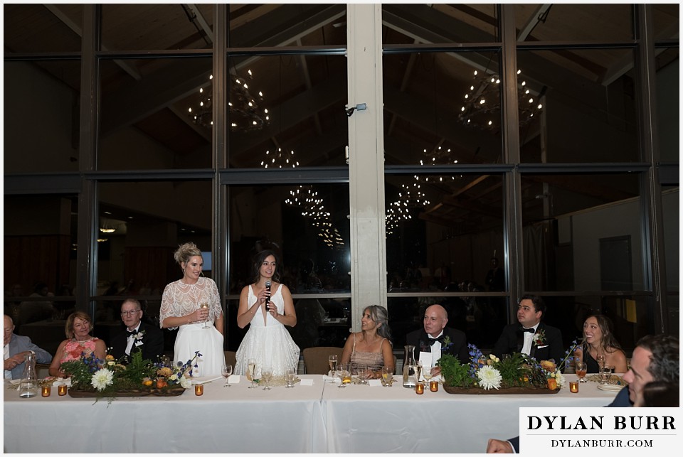 lgbtq wedding thunderhead lodge steamboat wedding brides toast to guests