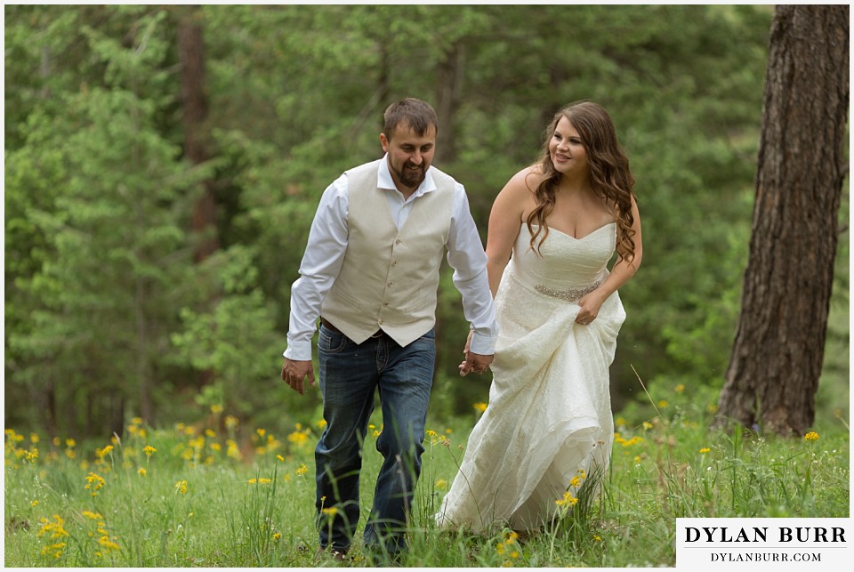 lost gulch overlook elopement wedding boulder co walking in grass