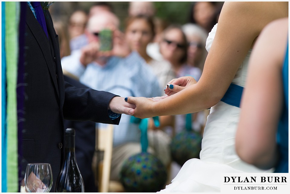 lyons farmette wedding exchanging rings