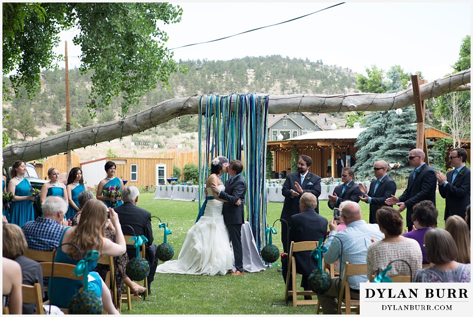 lyons farmette wedding first kiss as husband and wife