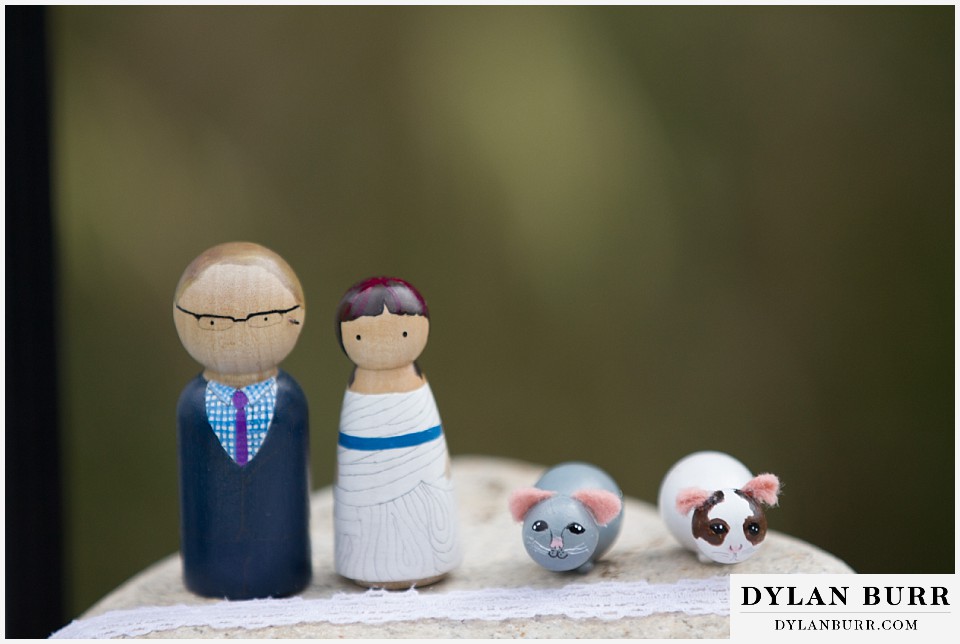 lyons farmette wedding wooden figuringes of bride and groom with pets