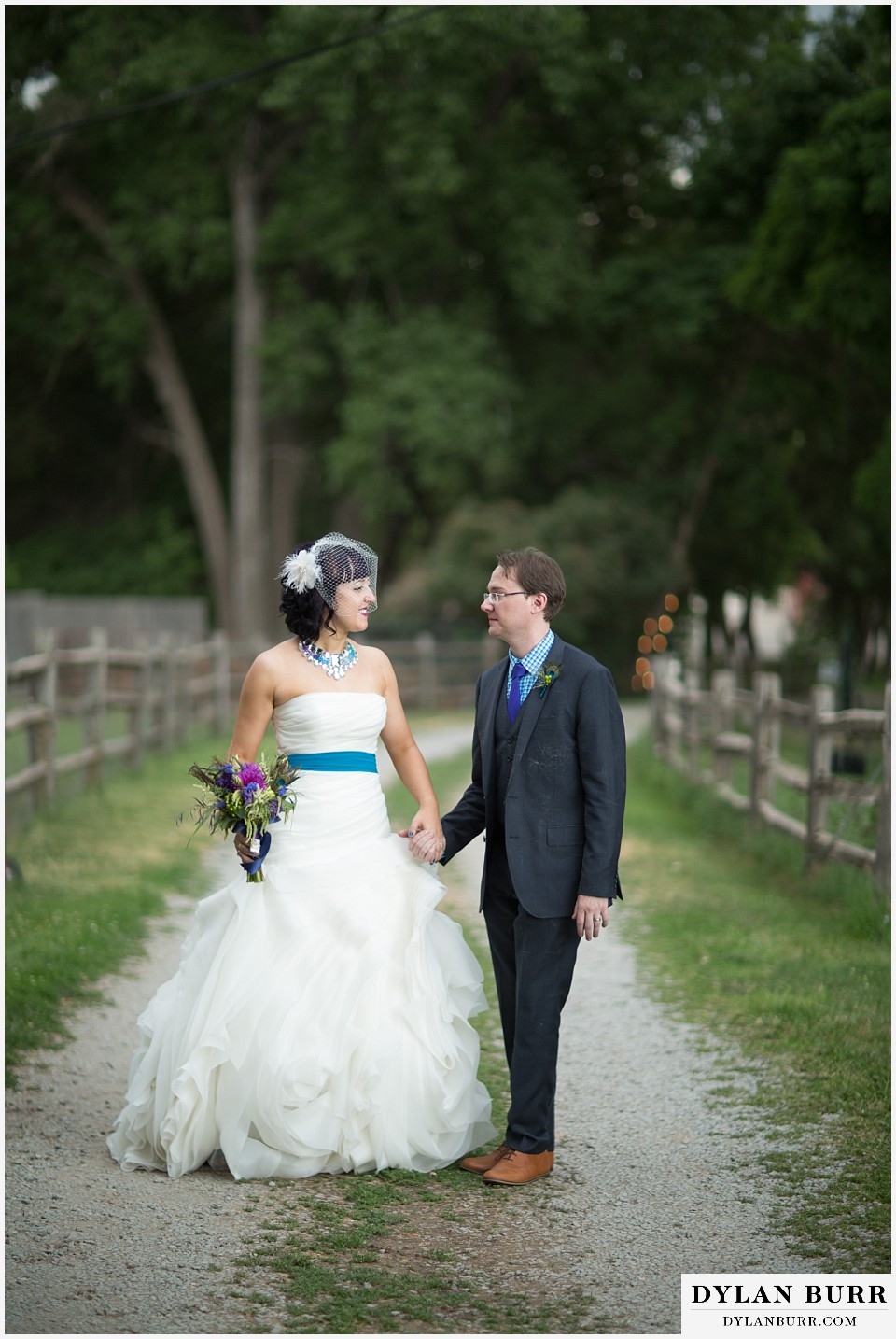 lyons farmette wedding bride and groom walking along road