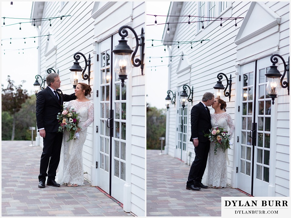 bride and groom the manor house wedding outside doorway