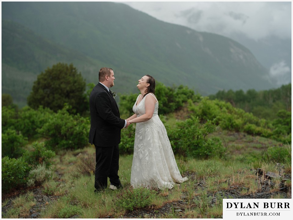 marble colorado elopement wedding newlyweds laughing together in mountains