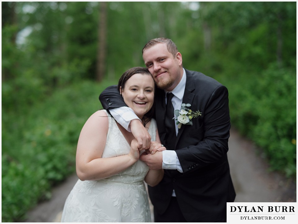 marble colorado elopement wedding newlyweds together in the rain