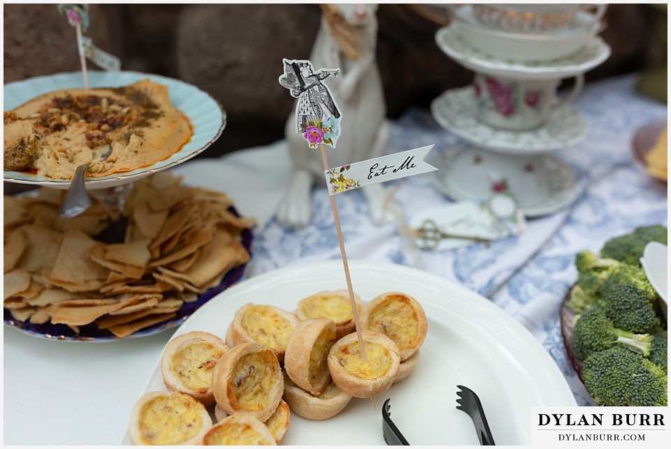 maroon bells wedding aspen colorado mountain wedding alice in wonderland theme quiches with eat me sign