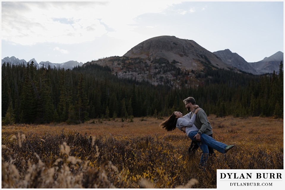 marriage proposal at brainard lake recreation area dancing in mountain valley