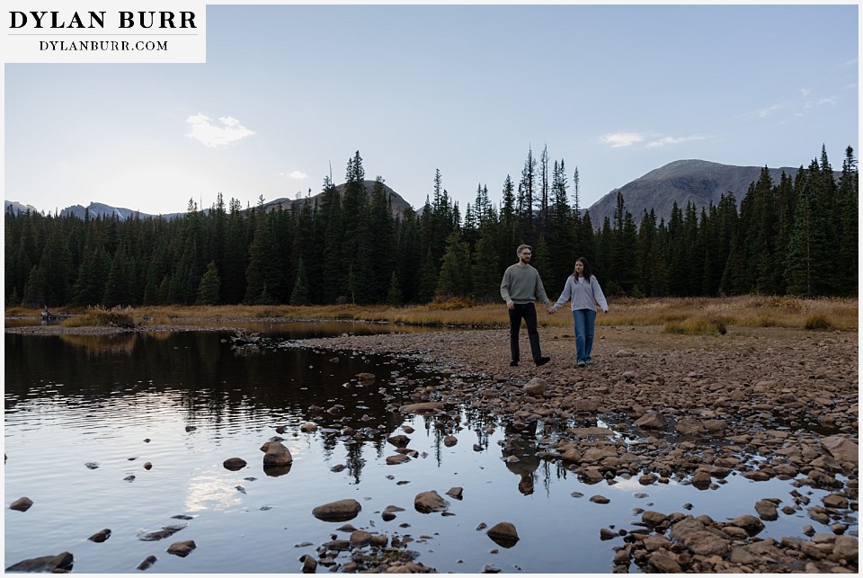 marriage proposal at brainard lake recreation area couple walking together near lake