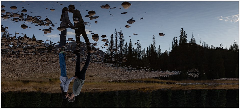 marriage proposal at brainard lake recreation area reflection of couple in lake