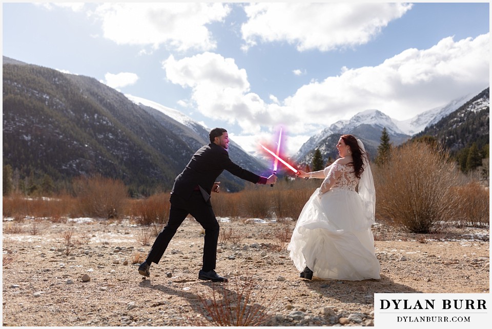 wedding couple lightsaber battle in colorado