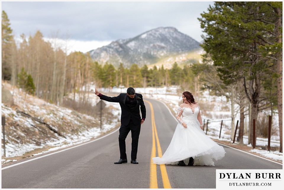 wedding couple dancing in the street