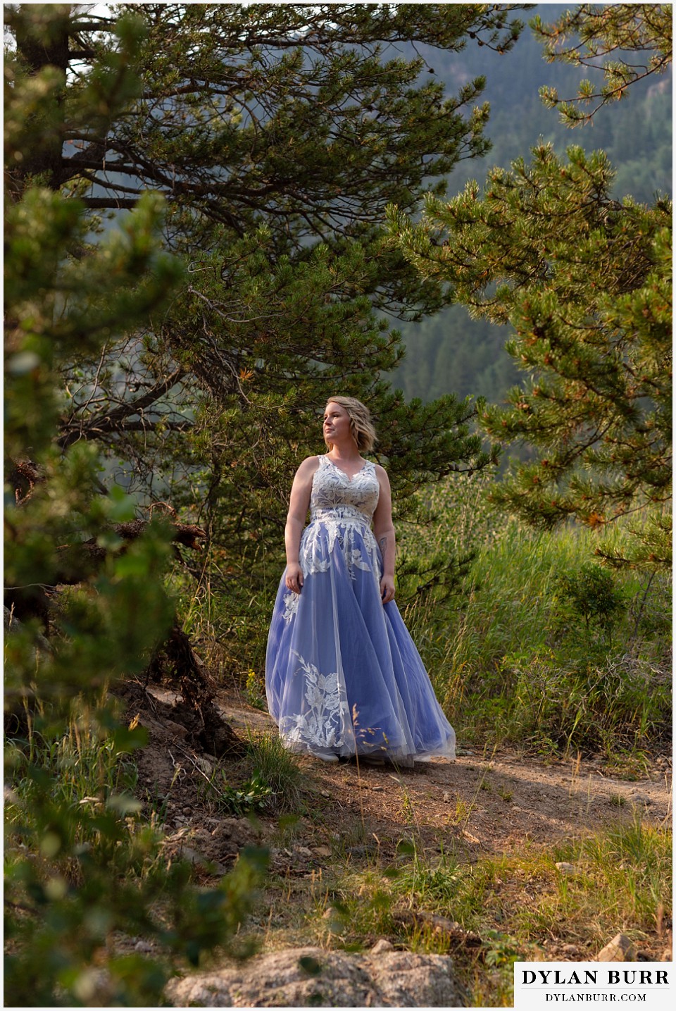 mountain adventure elopement wedding colorado bride in purple wedding dress in mountains
