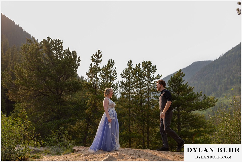 mountain adventure elopement wedding colorado bride and groom in close with tattoos