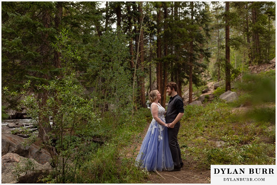 mountain adventure elopement wedding colorado pausing along mountain trail