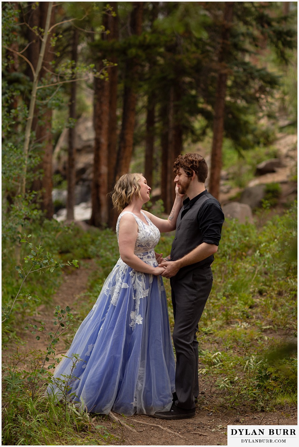 mountain adventure elopement wedding colorado bride and groom having a sweet moment