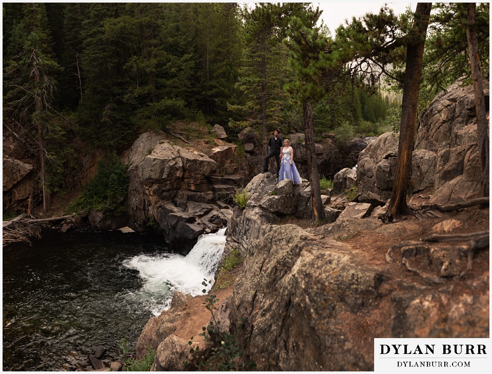 mountain adventure elopement wedding colorado wide view of river and trees with newlywed couple