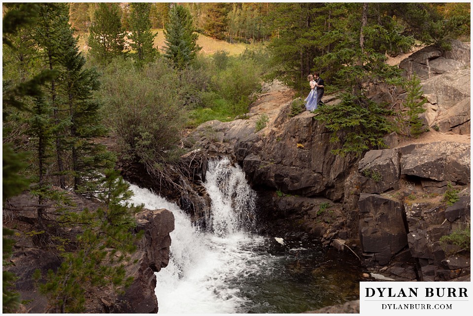 mountain adventure elopement wedding colorado super wide view of couple dancing together