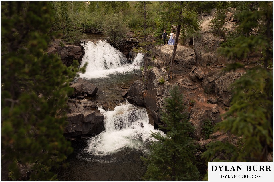 mountain adventure elopement wedding colorado double waterfall view with newlywed couples