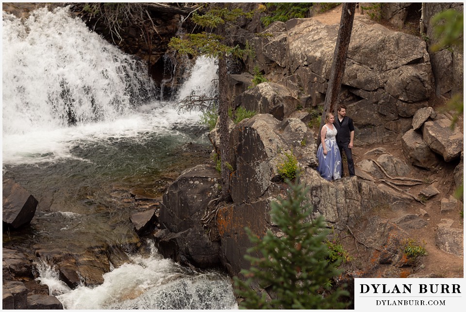 mountain adventure elopement wedding colorado bride and groom together at edge of river