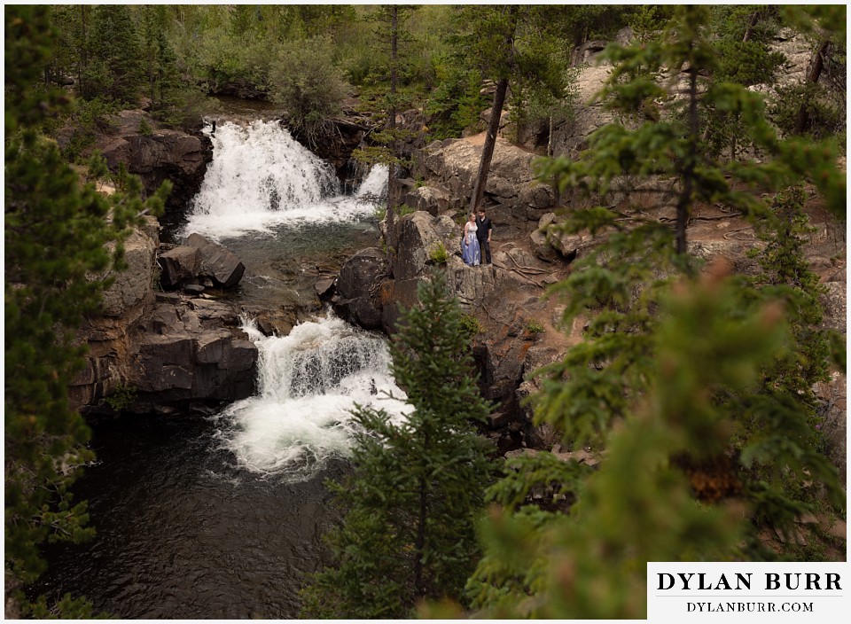 mountain adventure elopement wedding colorado double waterfalls with newlywed couple