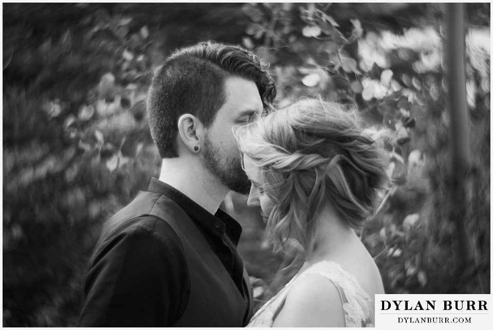 mountain adventure elopement wedding colorado glowing black and white photograph close to each other