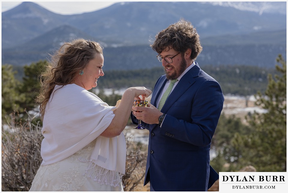 November elopement wedding in rocky mountain national park exchanging communion