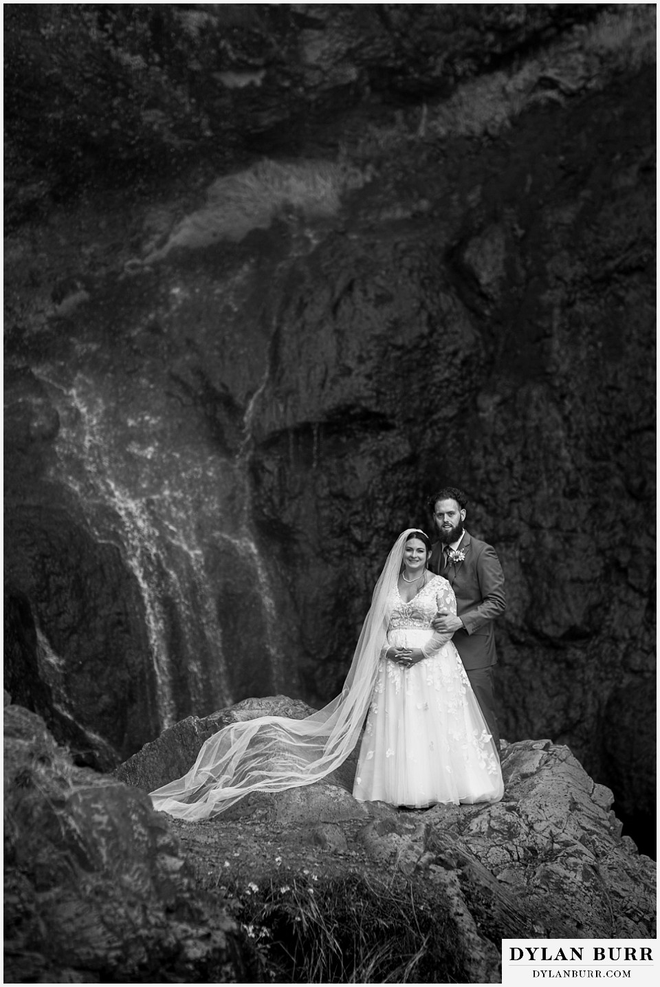 pagosa springs elopement newlyweds at mountain waterfall black and white