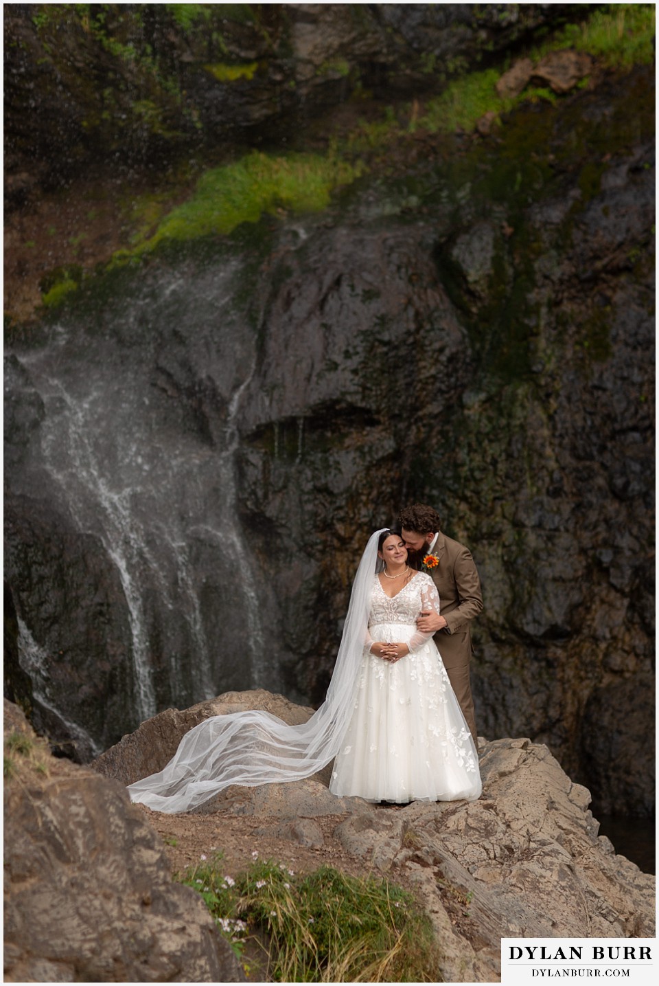 pagosa springs elopement bride and groom at waterfall