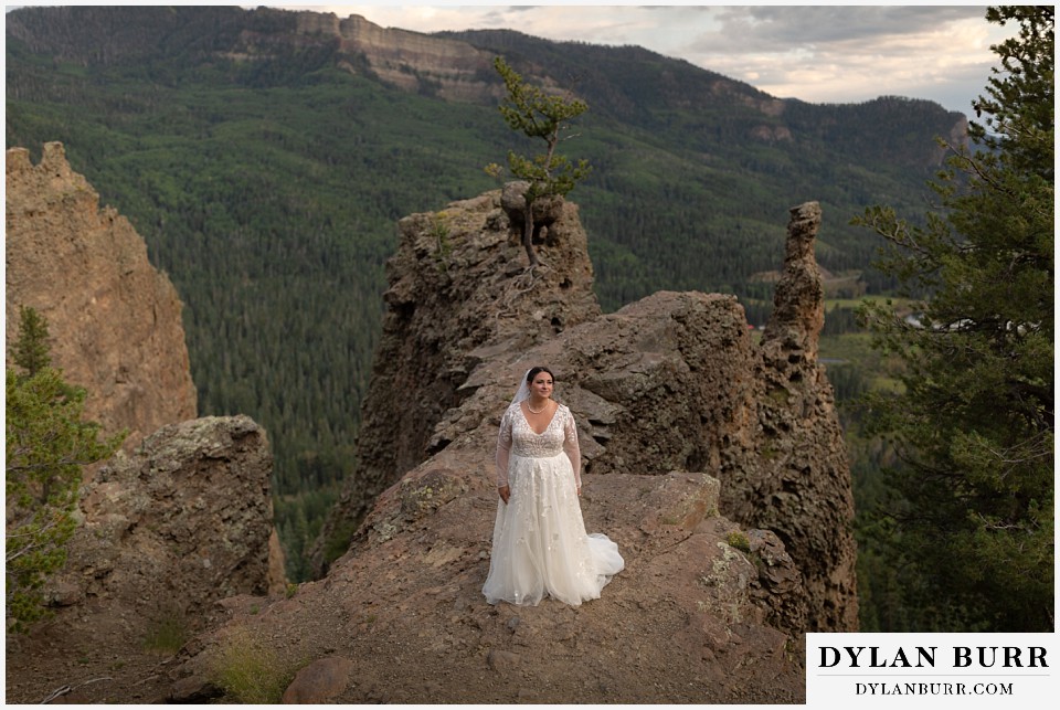pagosa springs elopement bride in interesting rock formations