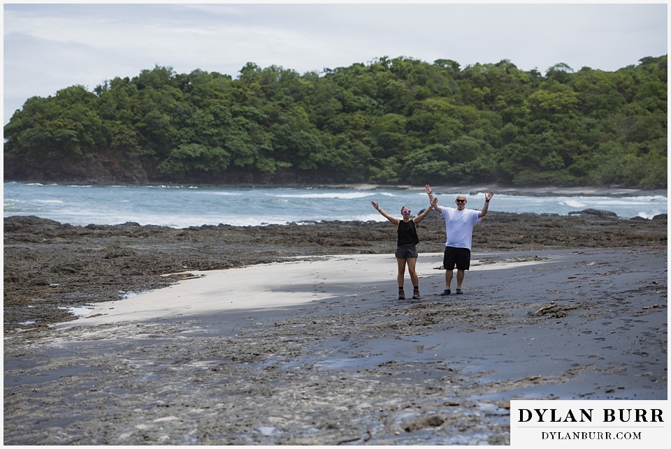 parque nacional marino las baulas travel photo session couple together on black sand beach
