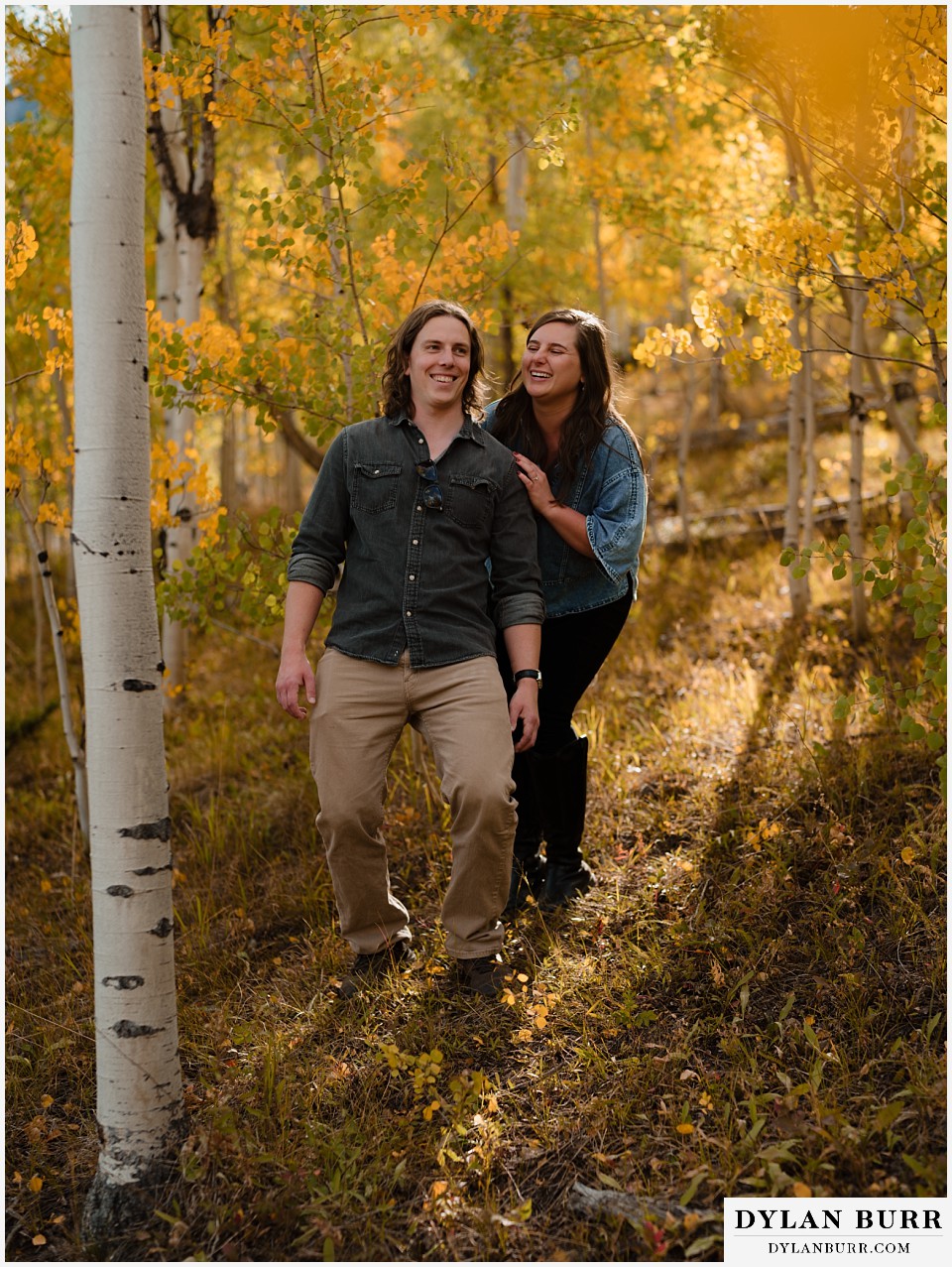 fall mountain engagement photo session being goofy together