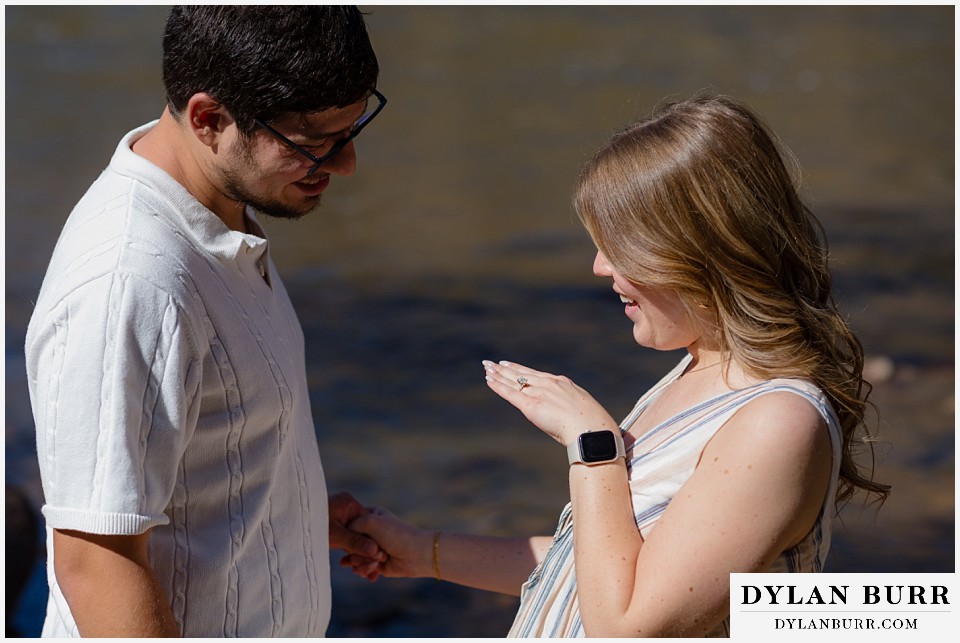 poudre canyon marriage proposal looking at ring
