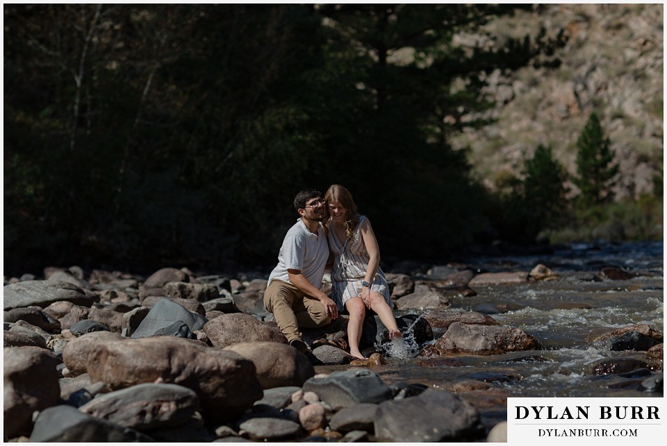 poudre canyon marriage proposal playing in water together