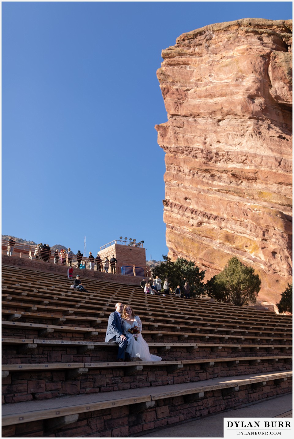 red rocks trading post wedding couple in amphitheater