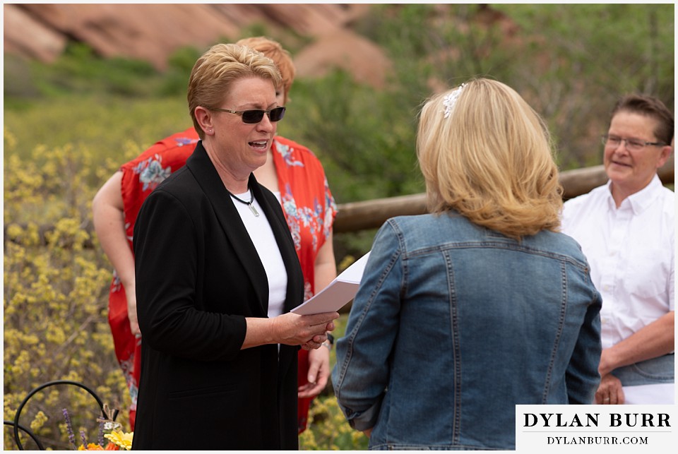 red rocks wedding morrison colorado reading vows to each other