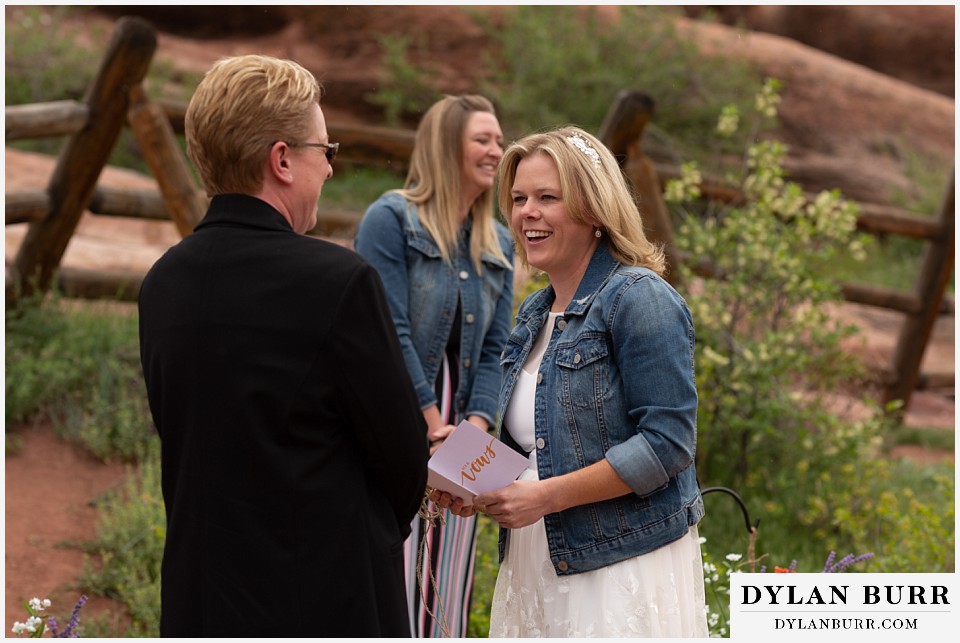red rocks wedding morrison colorado brides laughing together