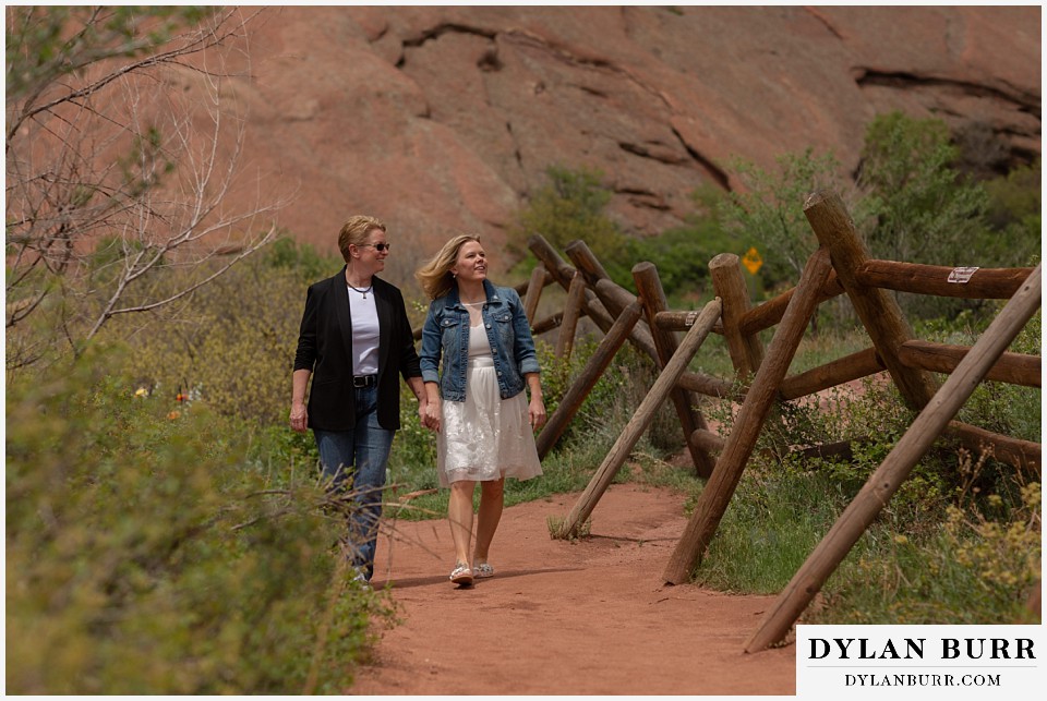 red rocks wedding morrison colorado couple walking together holding hands