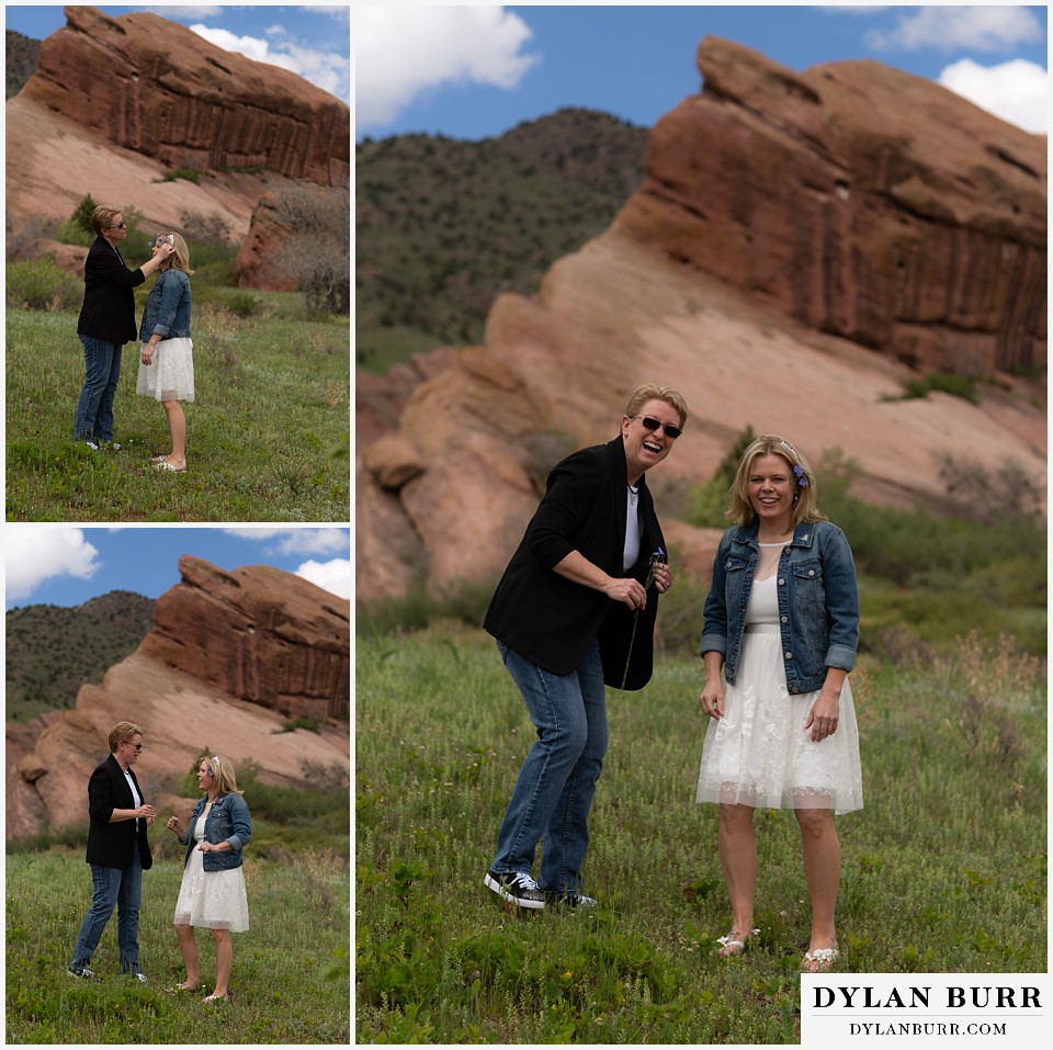 red rocks wedding morrison colorado newlyweds dancing in wildflower field