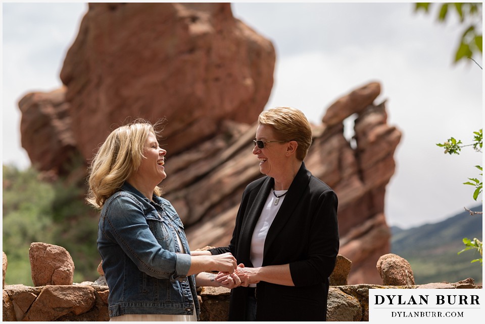red rocks wedding morrison colorado newlywed couple with interesting rock formations in background