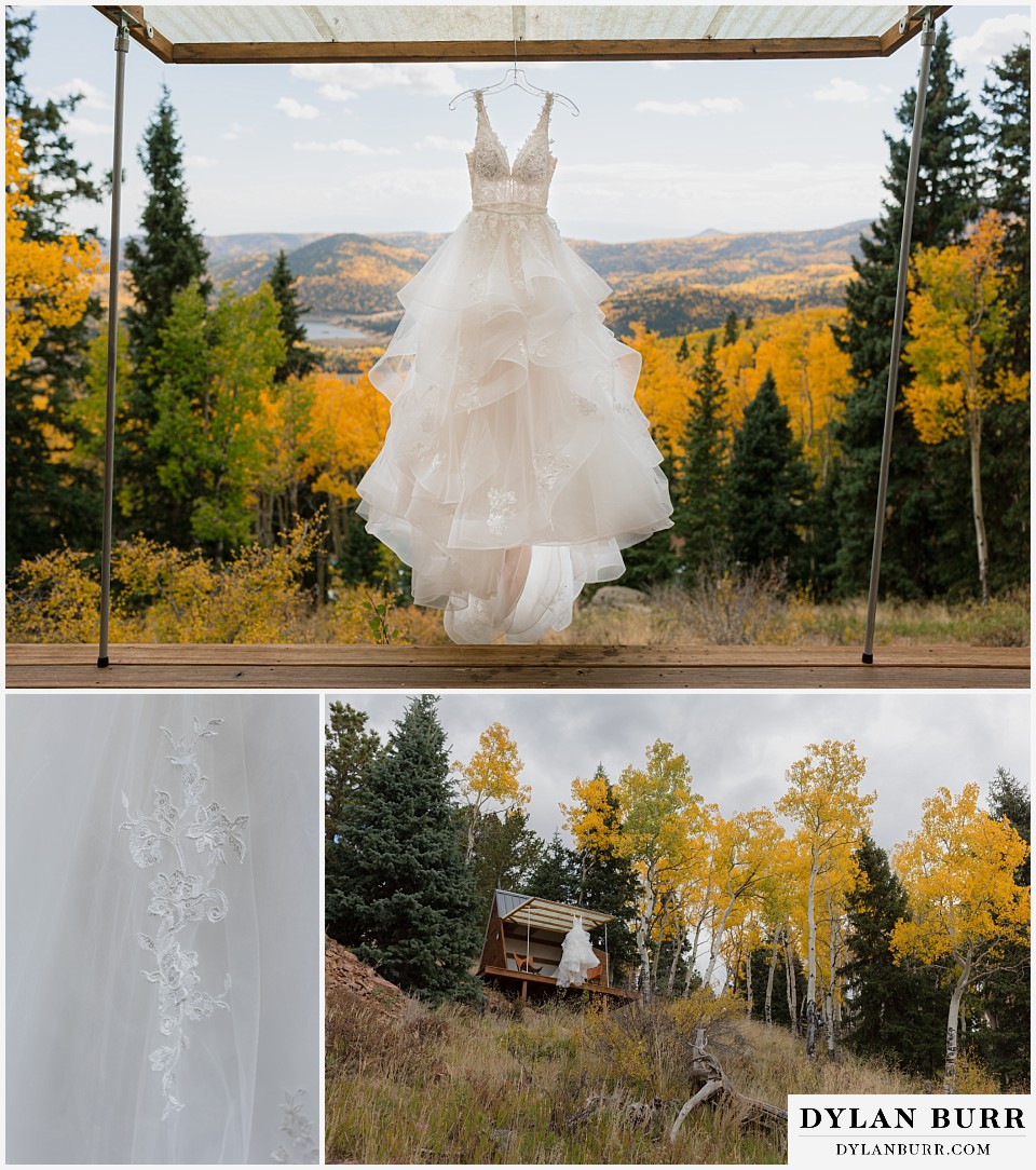 rhize weddings colorado wedding dress hanging at eagles nest cabin