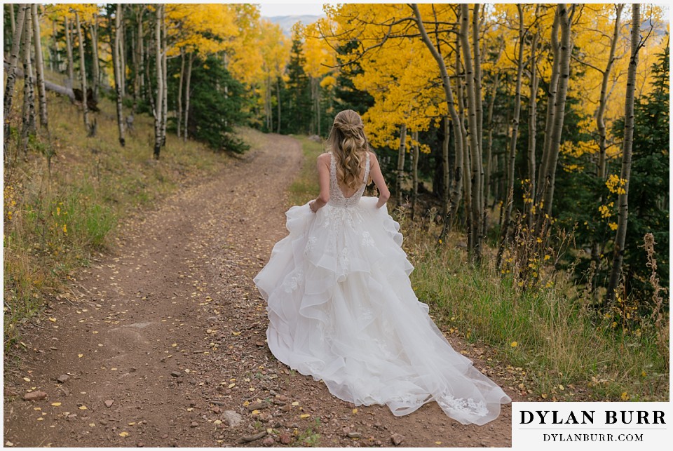 rhize weddings colorado in the fall walking on road