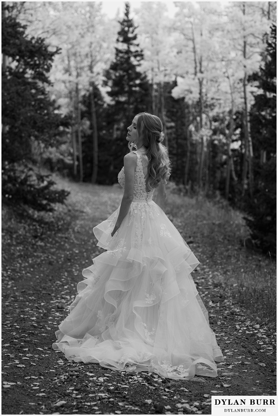 rhize weddings colorado black and white of bride enjoying mountain air waiting for first look