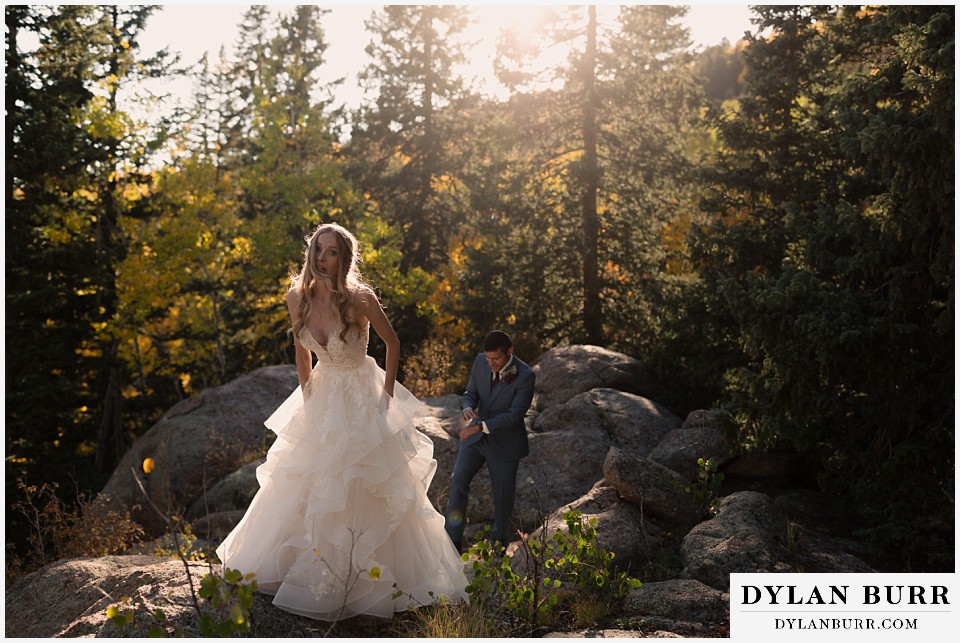 rhize weddings colorado bride being goofy hiking around