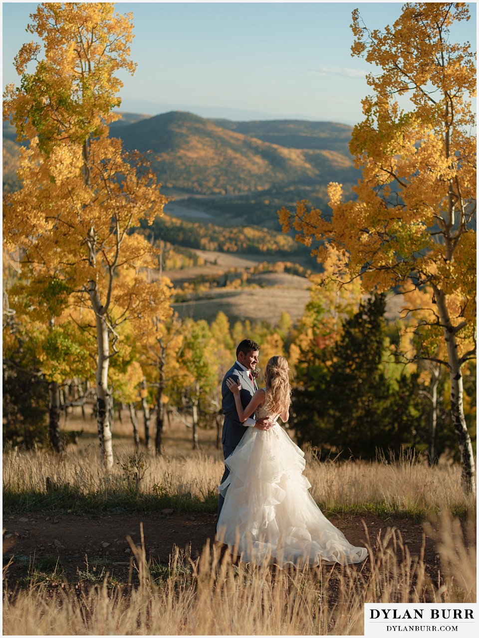 rhize weddings colorado bride and groom dancing together on road