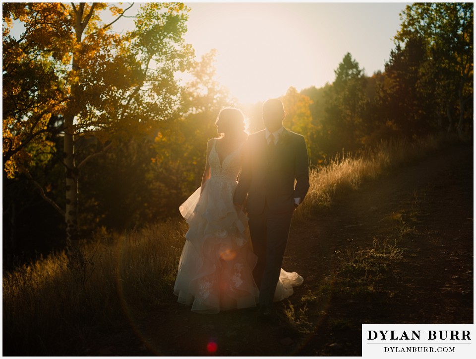 rhize weddings colorado cool sunset silhouettes in dust