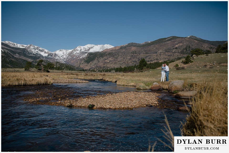 2nd chance at love rocky mountain elopement kissing riverside